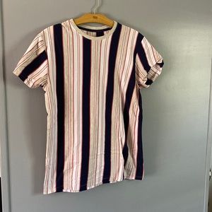 White striped shirt with gray, blue, and pink